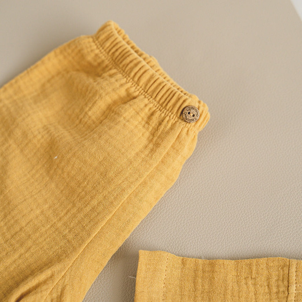 Calções, em musselina