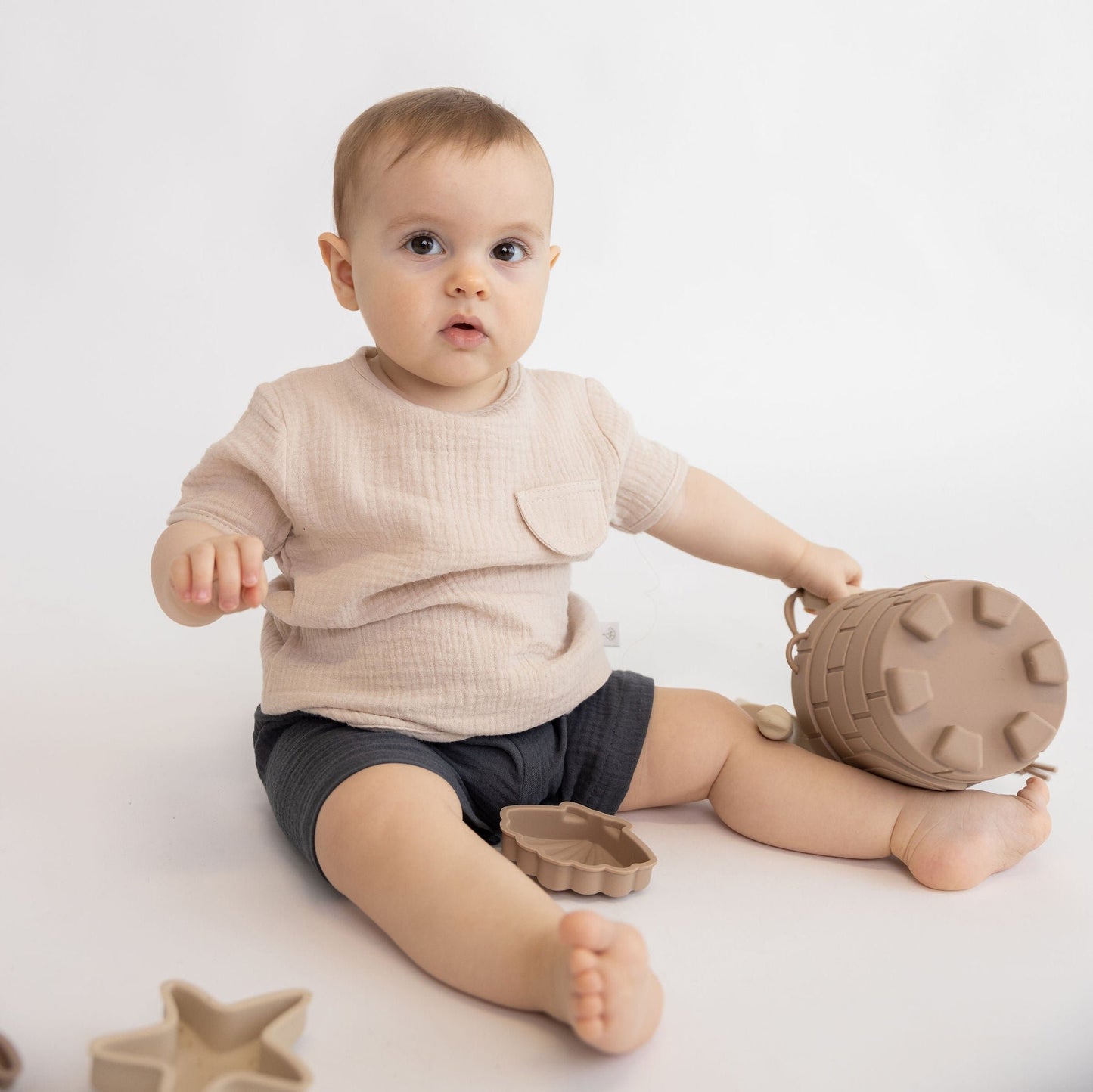 Calções, em musselina