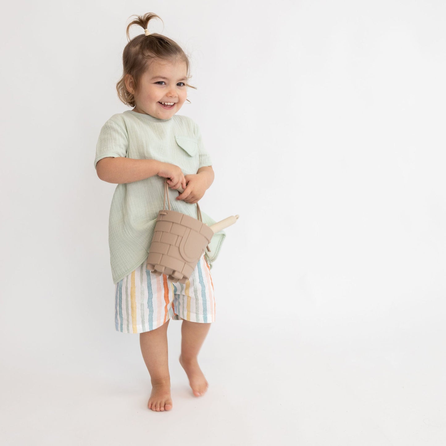 Calções em tecido às riscas