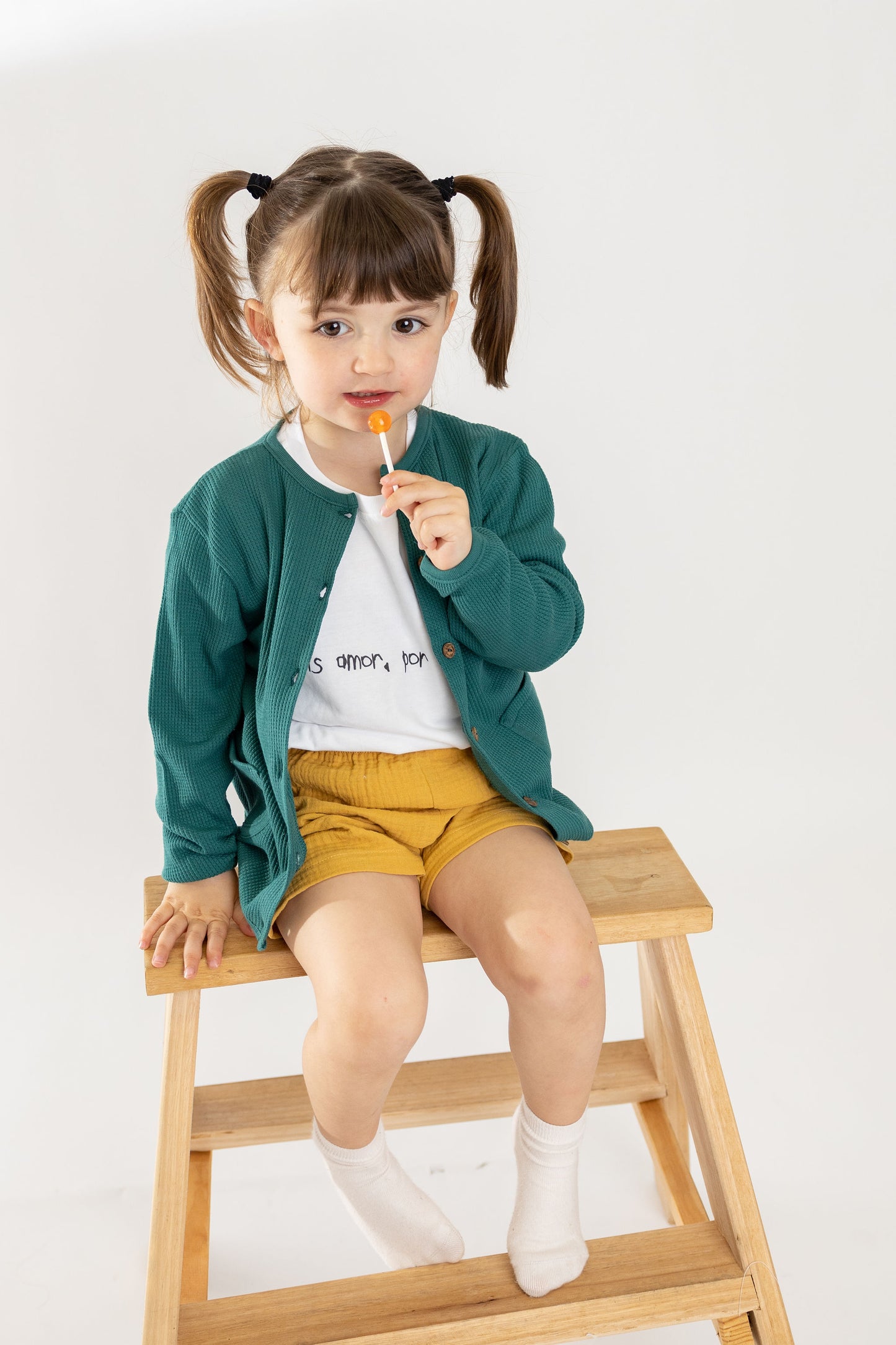 Casaco/cardigan com bolsos